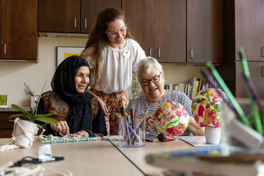 senior women at Gates Circle in art class